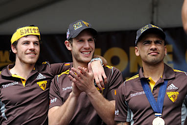 Hawks players soak up the moment.
