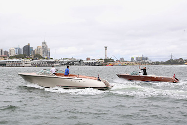 The pair hitting tennis balls between the two vessels.
