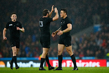 After the referee ended the fiercely contested contest, Williams hugged Conrad Smith. (Getty)