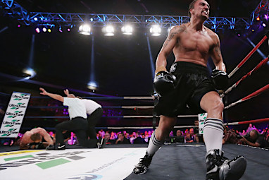 ... and celebrated as the referee ended the fight.