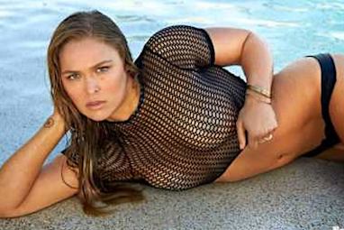 UFC queen Ronda Rousey also stripped down for the SI swimsuit edition.