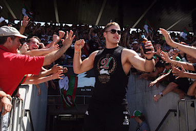 Try-scoring hero George Burgess soaks in the adoration, with beer in hand.