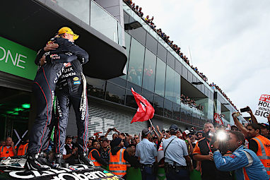 Lowndes and Richards - who claimed his fourth win - embraced atop the car.