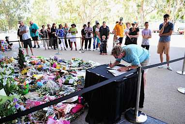 Dozens of fans left flowers outside the ground.