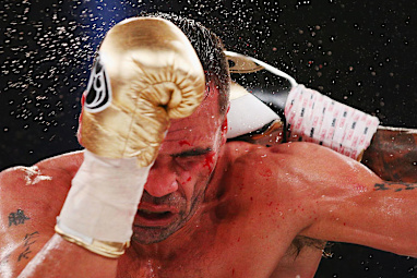 <b>Anthony Mundine is contemplating retirement after a crushing loss in his WBC Silver super welterweight title fight to American Charles Hartley.</b><br/><br/>The fight was stopped in the 11th round just as Mundine's father Tony threw in the towel at the Melbourne Convention Centre, handing Hatley a one-sided TKO victory.<br/><br/>Hatley will now likely fight for the world championship vacated by Floyd Mayweather Jr.