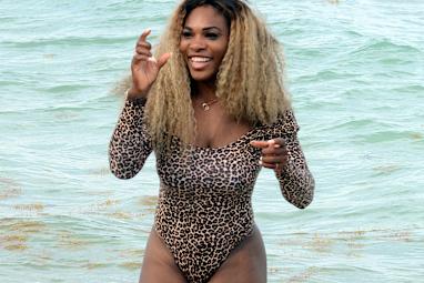 <b>Serena Williams appears to be over her French Open exit after turning heads in a revealing animal-print cossie while hanging out with Caroline Wozniaki at a Miami beach. </b><br/><br/>The world No1 left little to the imagination as she enjoyed herself with fellow Roland Garros flop Wozniaki, who recently split with her Irish fianc&eacute;, golfer Rory McIlory. <br/><br/>Williams even crashed a nearby wedding party, posing for photos with the happy bride and groom in her risque outfit.