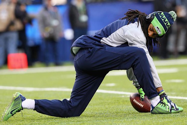 Controversial Seahawks star cornerback Richard Sherman stretched.