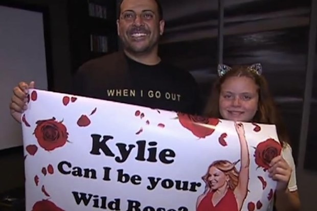 Terence Belletty with his daughter, who also loves Kylie.