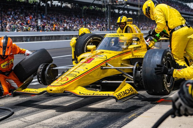 Scott McLaughlin mid-pit stop during the 2023 Indianapolis 500.