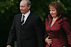 HEILIGENDAMM, GERMANY - JUNE 06:  Russian President Vladimir Putin (L) and his wife Lyudmila Putina arrive at the opening dinner of the G8 summit at Heiligendamm June 6, 2007 at Hohen Luckow, Germany. The summit runs from June 6-8.  (Photo by Sean Gallup/Getty Images)
