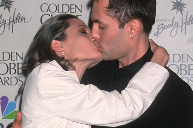 Sibling actors Angelina Jolie and James Haven kiss as they attend the 57th annual Golden Globe Awards at the Beverly Hilton Hotel, Beverly Hills, California, January 24, 2000