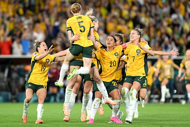 Cortnee Vine of Australia celebrates victory with her team mates after she scores her team's tenth penalty in the penalty shoot out during the FIFA Women's World Cup Australia & New Zealand 2023 Quarter Final match between Australia and France at Brisbane Stadium on August 12, 2023 in Brisbane, Australia. 
