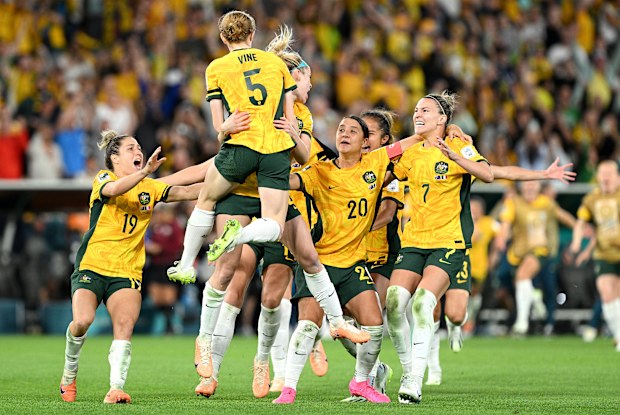 Cortnee Vine of Australia celebrates victory with her team mates after she scores her team's tenth penalty in the penalty shoot out during the FIFA Women's World Cup Australia & New Zealand 2023 Quarter Final match between Australia and France at Brisbane Stadium on August 12, 2023 in Brisbane, Australia. 