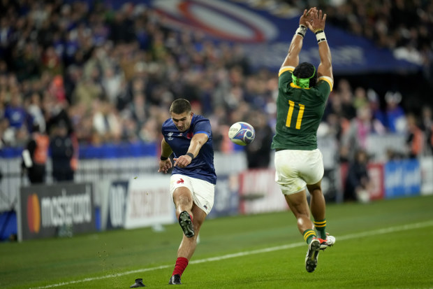 France's Thomas Ramos has his try conversion kick charged down by South Africa's Cheslin Kolbe.