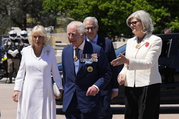 Queen Camilla and King Charles III are escorted by the Governor-General of Australia Sam Mostyn as they arrive at the Australian War Memorial on October 21, 2024 in Canberra, Australia. The King's visit to Australia is his first as monarch, and the Commonwealth Heads of Government Meeting (CHOGM) in Samoa will be his first as head of the Commonwealth.