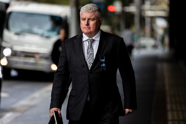 Former Australian cricketer Stuart MacGill arrives at Downing Centre Local court, Friday, 9 May 2025. Macgill, an Australian cricketing great will this morning learn whether he will be jailed after being found guilty by a District Court jury of helping to set up, and being present at, a meeting between the man and a street-level drug dealer, who can only be known as Person A, underneath his Neutral Bay restaurant in April 2021. Photo: Sam Mooy / The Sydney Morning Herald