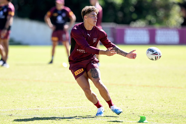 BRISBANE, AUSTRALIA - MAY 23: Reece Walsh passes the ball during the QLD Maroons State of Origin team training session at the Clive Berghofer Centre on May 23, 2023 in Brisbane, Australia. (Photo by Bradley Kanaris/Getty Images)