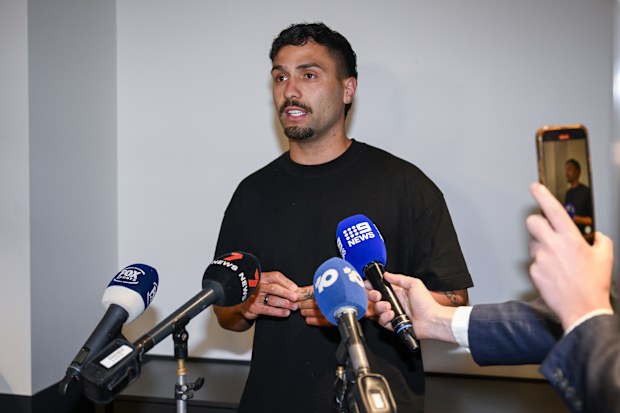 ADELAIDE, AUSTRALIA - SEPTEMBER 02: Suspended Adelaide Crows AFL player Izak Rankine speaks to the media at Adelaide Airport on September 02, 2025 in Adelaide, Australia. Rankine returns home  from his overseas trip, speaking publicly for the first time since he was suspended for a homophobic slur in the AFL match on August 16th. (Photo by Mark Brake/Getty Images)