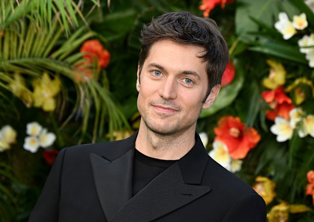 Lucas Bravo attends the World Premiere of "Ticket to Paradise" at Odeon Luxe Leicester Square on September 07, 2022 in London, England. 