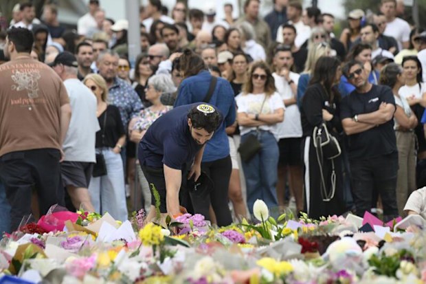 People have laid flowers to honour the lives lost in yesterday's mass shooting.