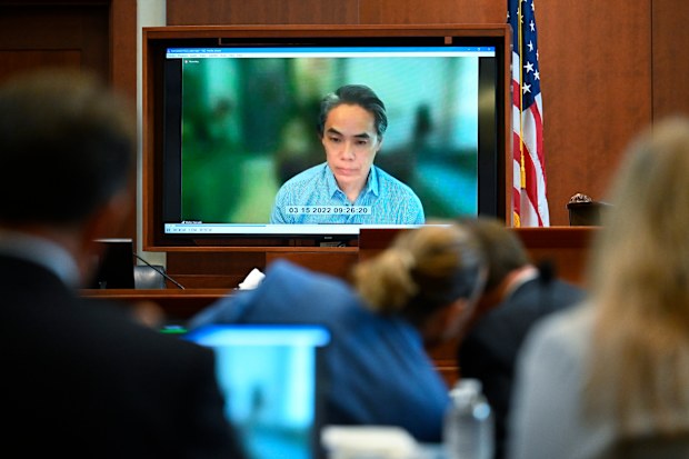 President, DC-Based Film Production, Warner Bros. Pictures, Walter Hamada, in pre-recorded testimony speaks during trial at the Fairfax County Circuit Courthouse in Fairfax, Virginia, on May 24, 2022. -  