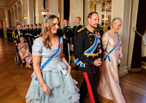 From left, Norway's Princess Ingrid Alexandra, Crown Prince Haakon and Crown Princess Mette-Marit on their way to a gala dinner at the Palace in connection with the state visit of the Icelandic presidential couple, in Oslo, Tuesday, April 8, 2025. (Fredrik Varfjell/NTB via AP)