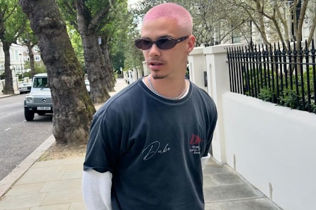 Romeo Beckham debuts a new pink buzz cut