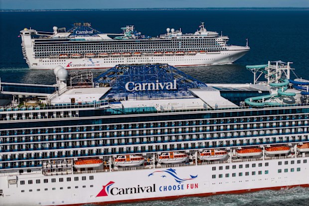 Carnival Adventure and Carnival Encounter sailing side by side1 copy