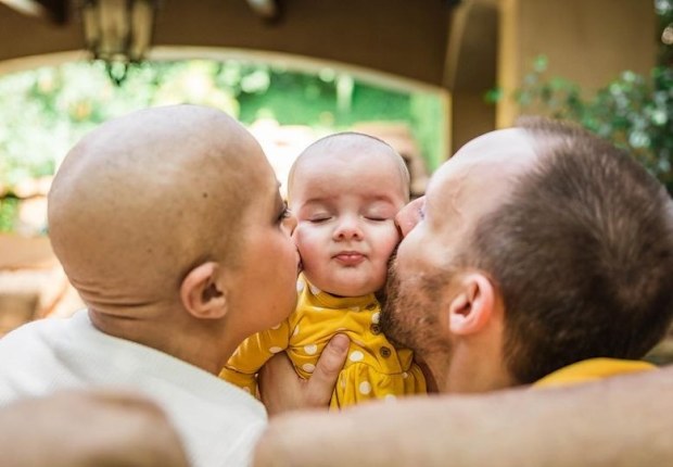 Jessica and husband Alec and their daughter Regina.