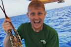 The victim of a horror shark attack in Far North Queensland has been identified as Cairns father Michael Jensz.