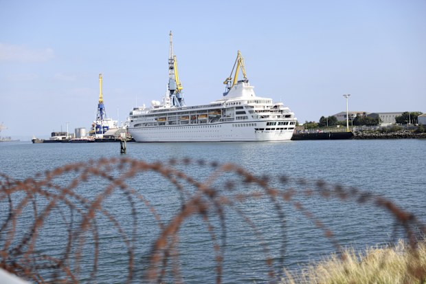The Odyssey, a US cruise liner operated by Villa Vie Residences docked at Harland & Wolf ship repair facility in Belfast Harbour, Northern Ireland, Friday, Aug. 30, 2024. (AP Photo/Peter Morrison)