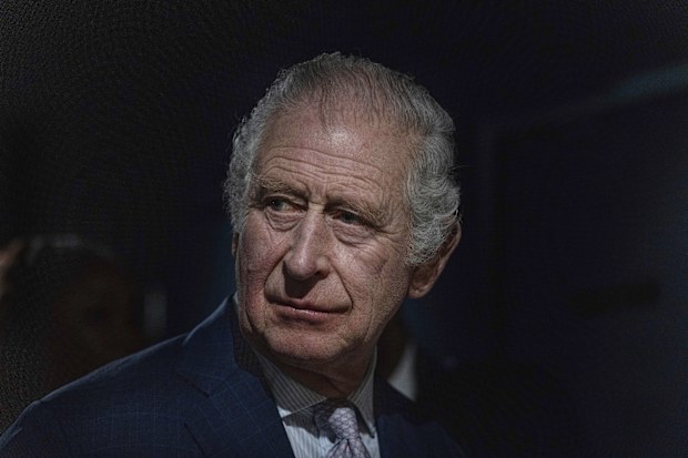 King Charles III looks on during a visit to the Africa Centre in Southwark, London, Thursday, Jan. 26, 2023