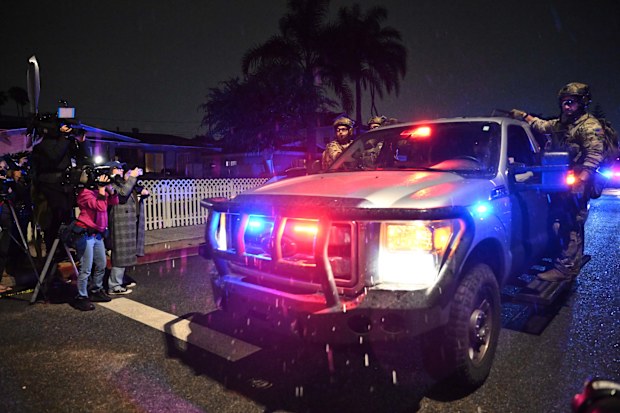 FBI officers at an address connected to Cole Tomas Allen, the shooting suspect at the White House Correspondents Dinner in Torrance, California.