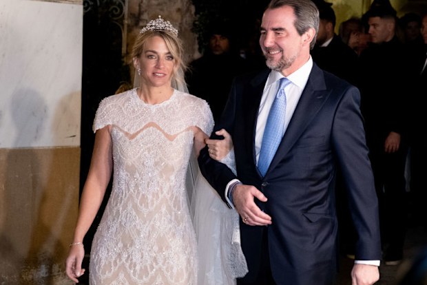 Prince Nikolaos of Greece and Chryssi Vardinogianni greet after the wedding at the Church of St. Nicholas Ragkavas in the Plaka district in Athens, Greece, on February 7, 2025. (Photo by Nikolas Kokovlis/NurPhoto via Getty Images)