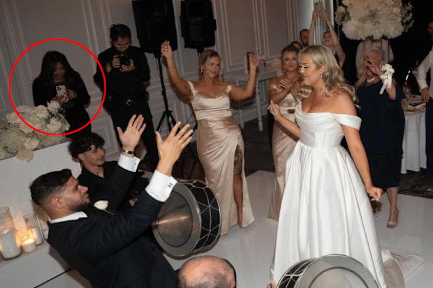 Kristine Sattore working as a wedding content creator.