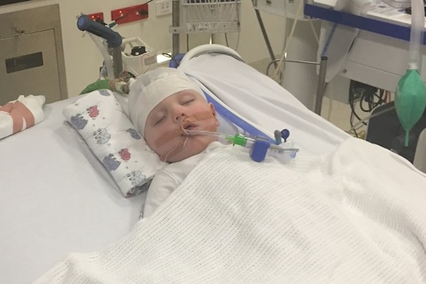 Spencer McPherson with his mum in hospital.