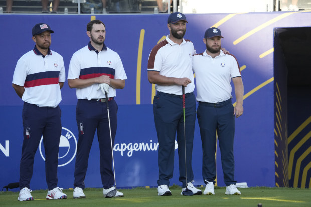 United States' Xander Schauffele and Patrick Cantlay at the Ryder Cup with Europe's Jon Rahm and Tyrrell Hatton.