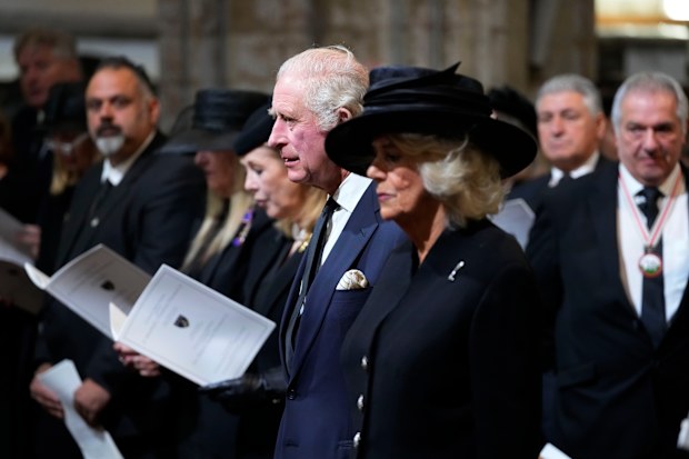 Britain's King Charles III and Camilla, the Queen Consort arrive for a Service of Prayer and Reflection.