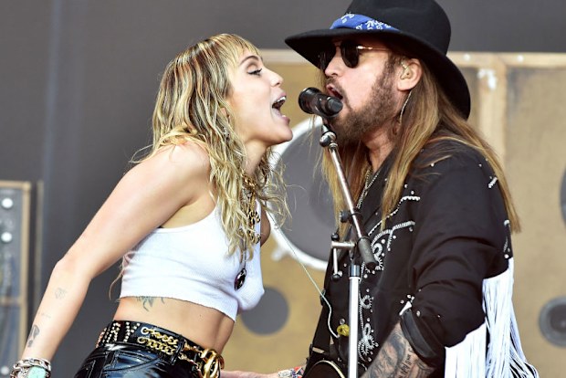 GLASTONBURY, ENGLAND - JUNE 30: Billy Ray Cyrus performs with Miley Cyrus on The Pyramid Stage during day five of Glastonbury Festival at Worthy Farm, Pilton on June 30, 2019 in Glastonbury, England. (Photo by Shirlaine Forrest/WireImage)
