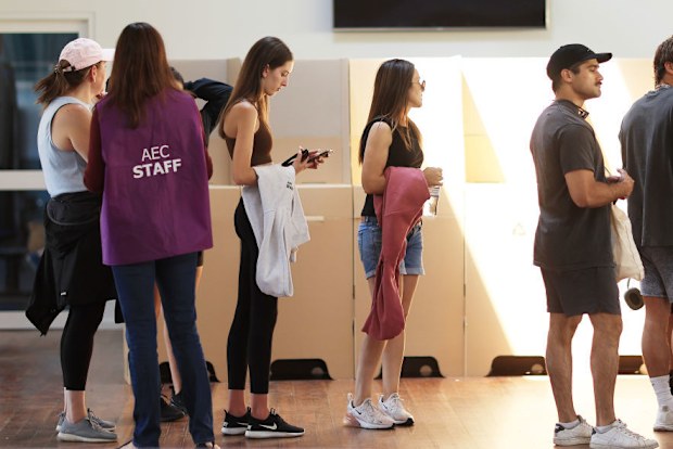 SYDNEY, AUSTRALIA - OCTOBER 14: SYDNEY, AUSTRALIA - OCTOBER 14: People line up to vote at Clovelly Surf Life Saving Club polling centre on October 14, 2023 in Sydney, Australia. A referendum for Australians to decide on an indigenous voice to parliament was held on October 14, 2023 and compelled all Australians to vote by law. Early voting began on Oct. 2, and activity has been intensifying in both the YES and NO camps, with multiple polls showing the YES campaign headed for defeat nationally. A