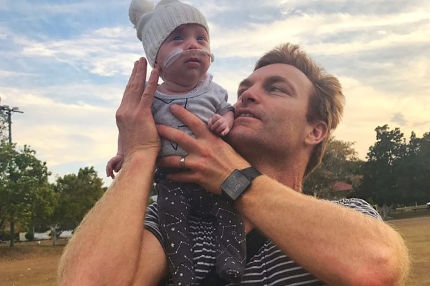 Ben Squiers with eldest daughter Imogen after bring her home from NICU.