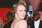 <p>Years after the 2000 Oscars, Theron revealed her orange Vera Wang dress had an unexpected impact on her career.</p><p>"I can't tell you how many times I've auditioned for a role, only to have my agent come back and say, "Listen, Charlize, they saw you in the orange dress and they don't think you can do it," she said, <a href="https://www.baltimoresun.com/news/bs-xpm-2004-01-01-0401010052-story.html" target="_blank" rel="" title="in a 2004 interview">in a 2004 interview</a>.</p>