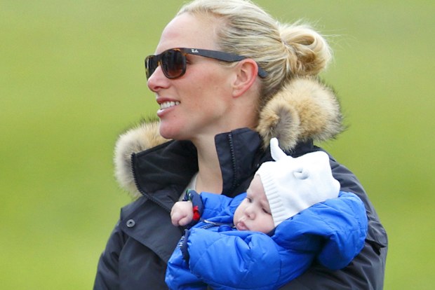 Zara Phillips carries daughter Mia Tindall at the SYMM International Horse Trials on April 19, 2014, in Hambleden, England. 