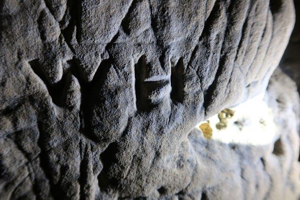 The eerie markings in the cave were made to warn people of evil figures inside, experts believe.