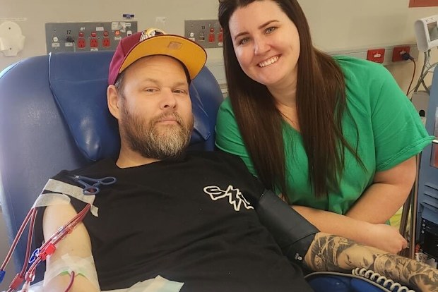 Simon and Nikita Biggs in hospital on their third wedding anniversary in 2025.