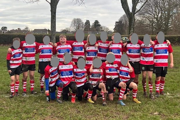 In the team photo it is clear Alfie is the perfect size to play under 12s.