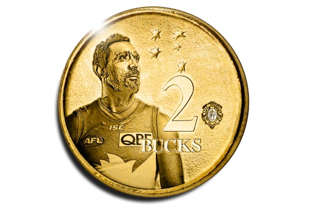 The redesigned "two bucks" coin features former AFL player Adam Goodes. (Aaron Tyler)