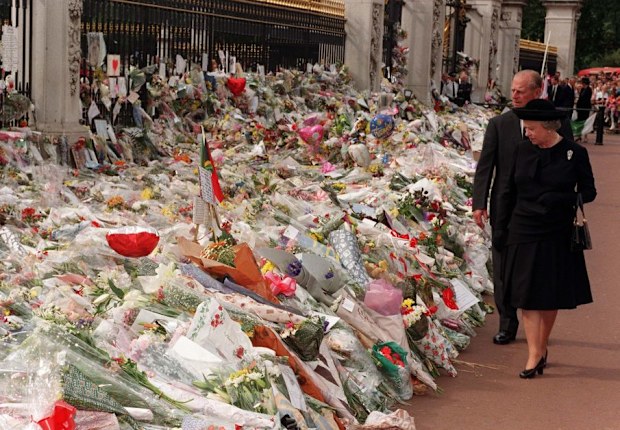 The Queen and Duke of Edinburgh view the floral tributes to Diana, Princess of Wales at Buckingham Palace on Friday September 5, 1997. Photo by John Stillwell.