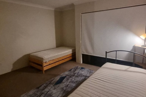 A listing for a sharehouse in Chippendale boasts two single beds for rent at $250 each