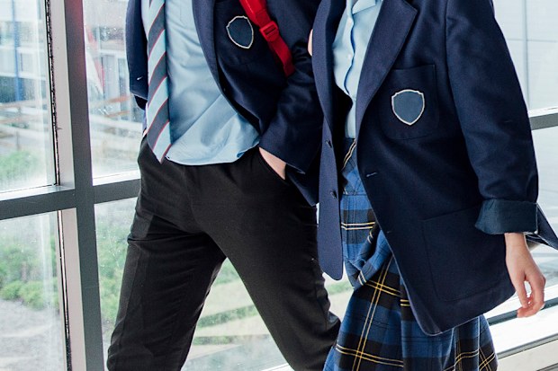 High school students walking to their next class.